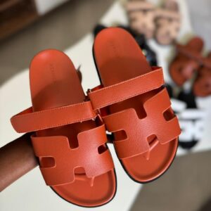 HERMES CHYPRE SANDALS — ORANGE