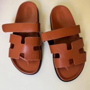 HERMES CHYPRE SANDALS — BROWN