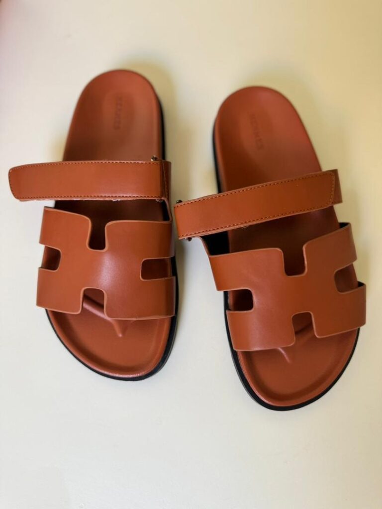 HERMES CHYPRE SANDALS — BROWN